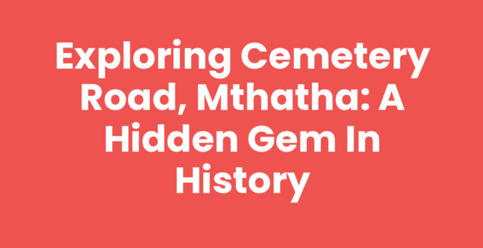 Historical marker on Cemetery Road, Mthatha with trees and graves